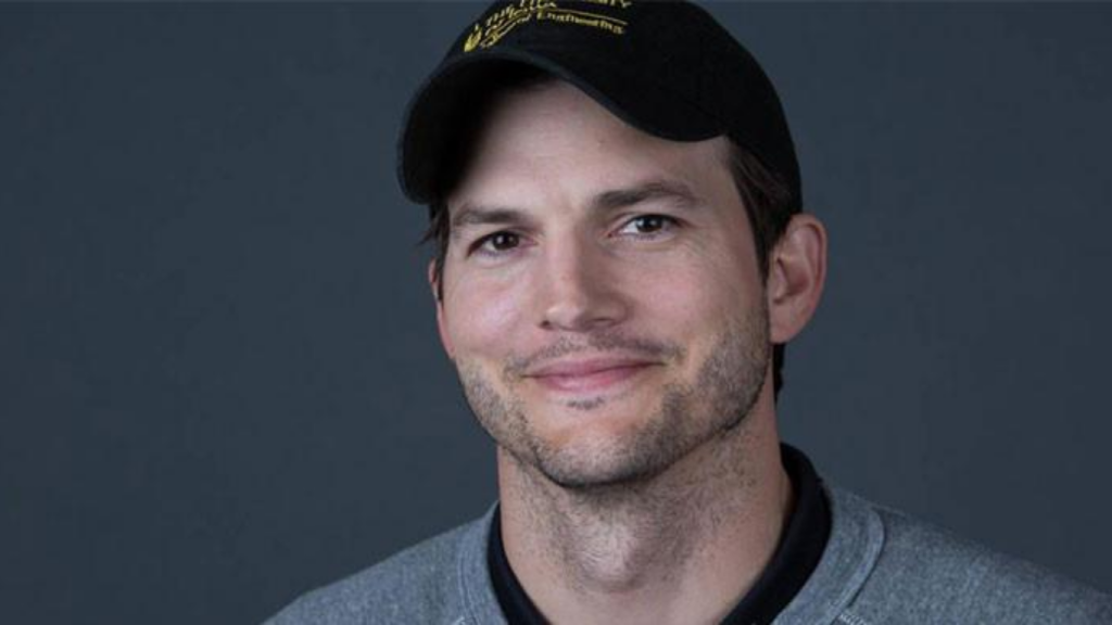Hollywood actor and tech investor Ashton Kutcher posing for a professional portrait in 2026.