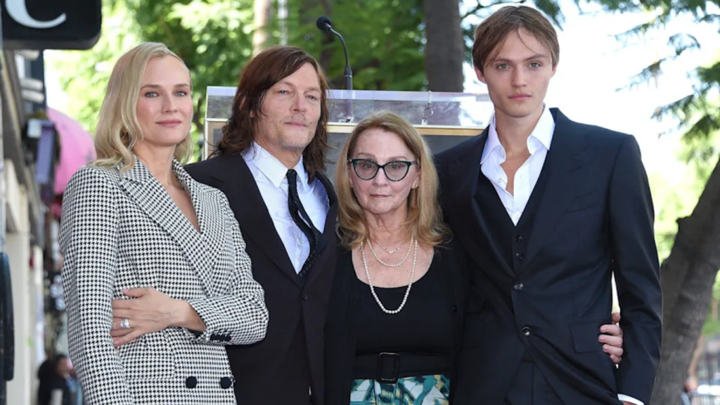 Norman Reedus with mother Marianne Reedus, partner Diane Kruger, and son Mingus Reedus at a public event.